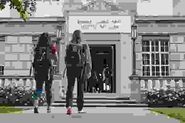 students in front of the Hall of Letters